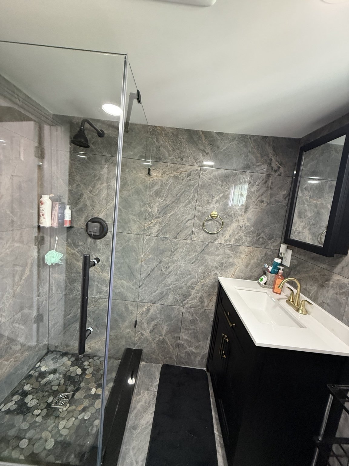 Tiled Shower and Bathroom Vanity